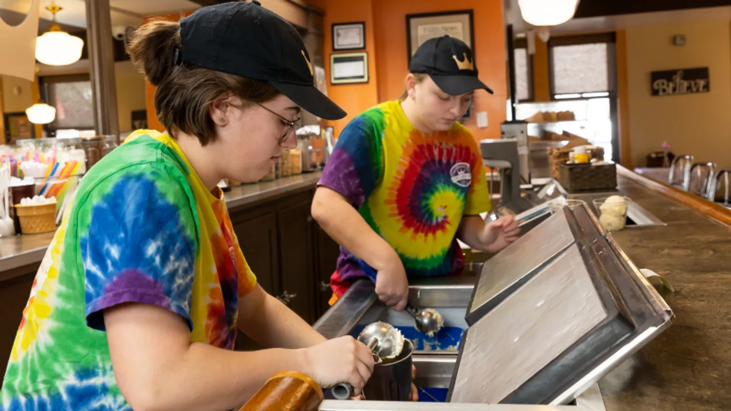 Queen City Creamery Scooping Ice Cream